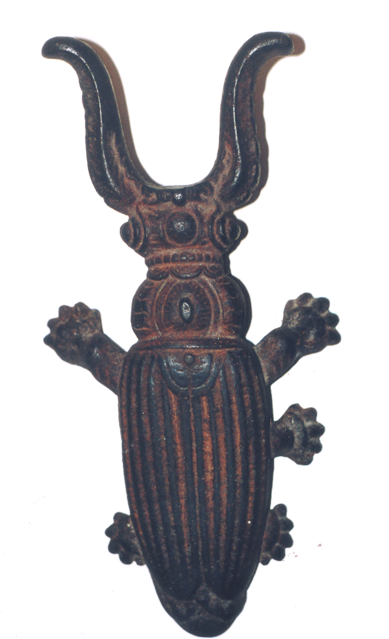 Odlew żeliwny w kształcie owada z czułkami, używany jako sebuwacz.